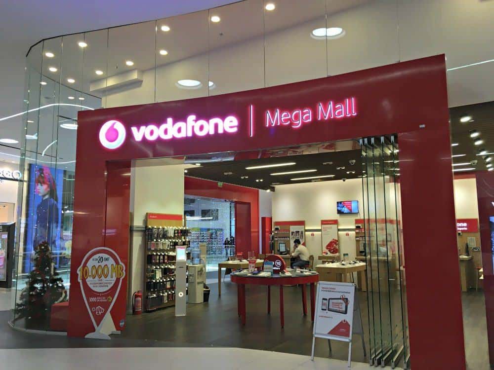 The outside of a store with Vodafone | Mega Mall above the entrance.