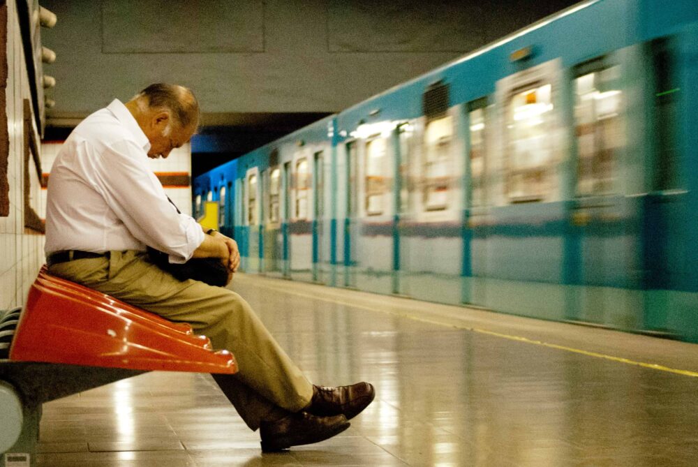 Man sleeping on subway