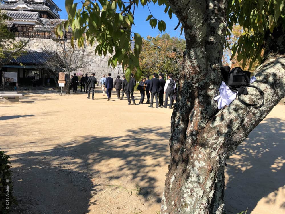 Matsuyama-camera, tree, and people