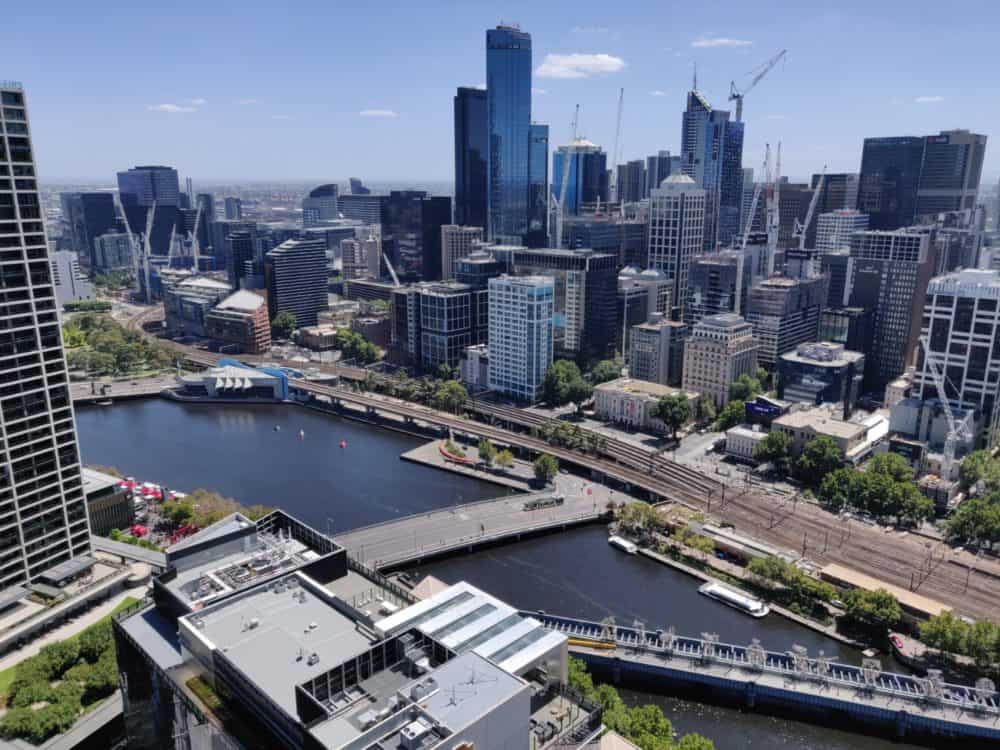 View of the Melbourne city skyline looking down and across towards a river and skyscrapers