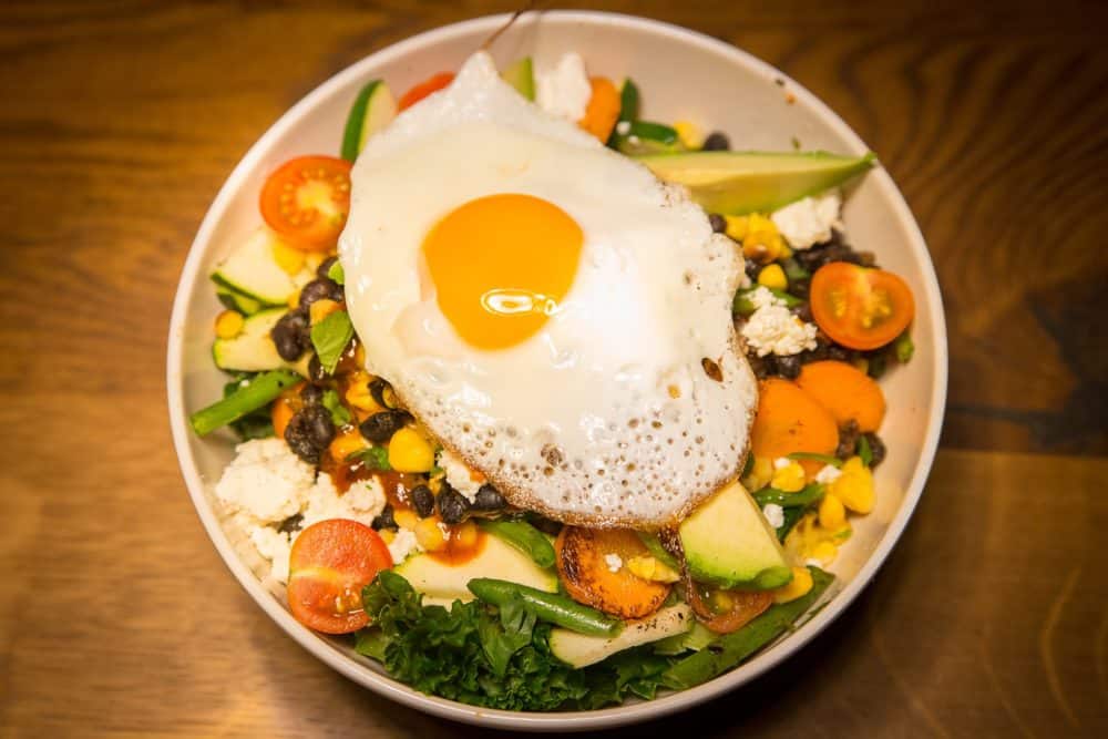 Salad with fried egg