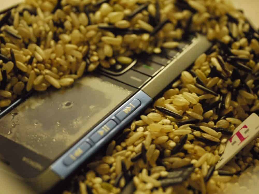 Phone sitting in rice