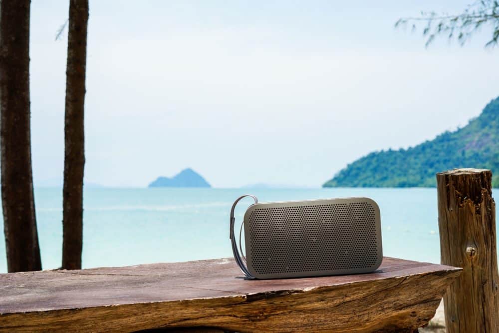 Speaker on bench overlooking the ocean