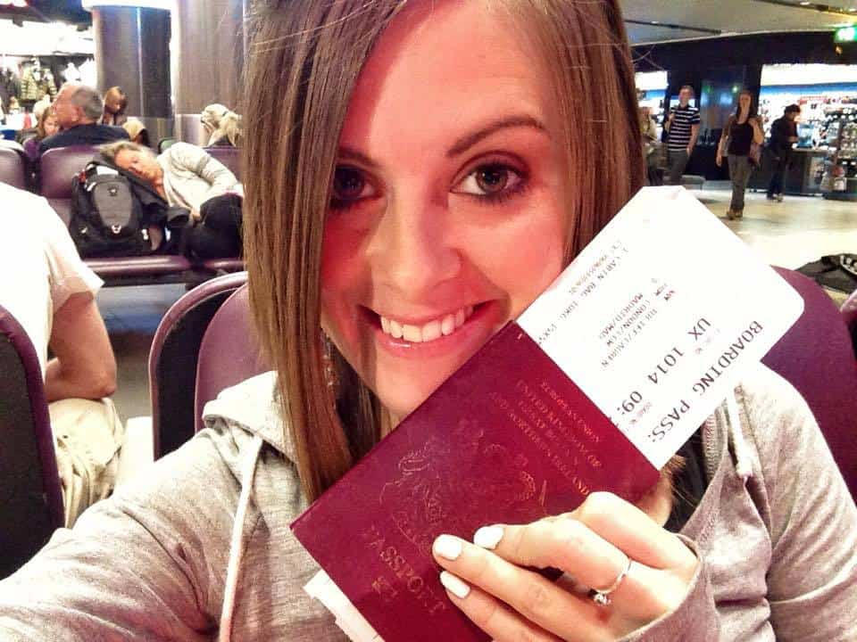 Lauren holding up her passport