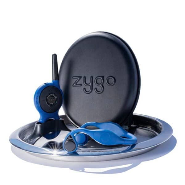 Zygo Solo headset, transmitter, and charging case on metal tray