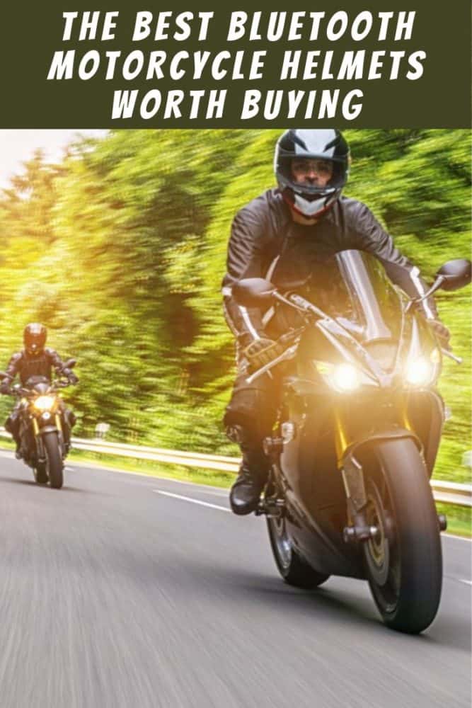 Two motorcyclists riding on a road through a forest, with text "The Best Bluetooth Motorcycle Helmets Worth Buying" above