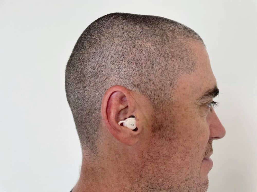 Man wearing Soundcore Sleep A10 earbud in ear