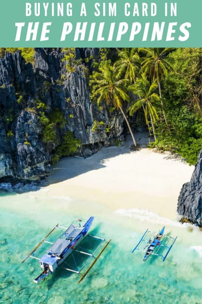 Outrigger boat pulled up on a beach in the Palawan area of the Philippines, with limestone cliffs behind. Text "Buying a SIM card in the Philippines" at top