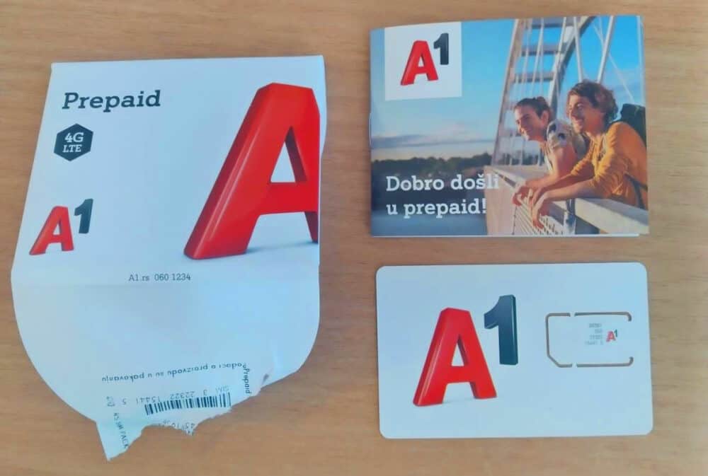 A1 SIM card package and contents, including the SIM card itself in a plastic holder, and instruction manual (in Serbian)