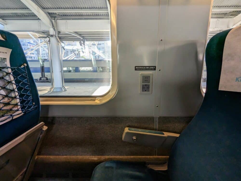 Power and USB sockets on wall of KTX train in South Korea