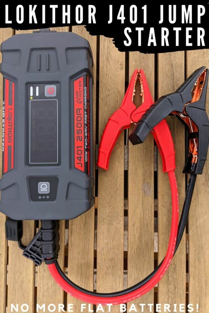 Lokithor J401 portable jump starter with a set of jumper leads attached, sitting on a wooden table. Text at top reads "Lokithor J401 Jump Starter", and text at bottom reads "No More Flat Batteries!"